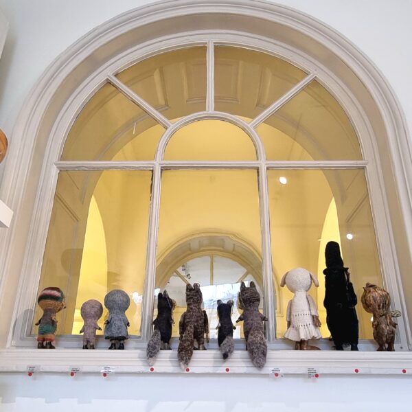 Julie Arkell's mixed media line up, peering into the CAA space, all sold at the show