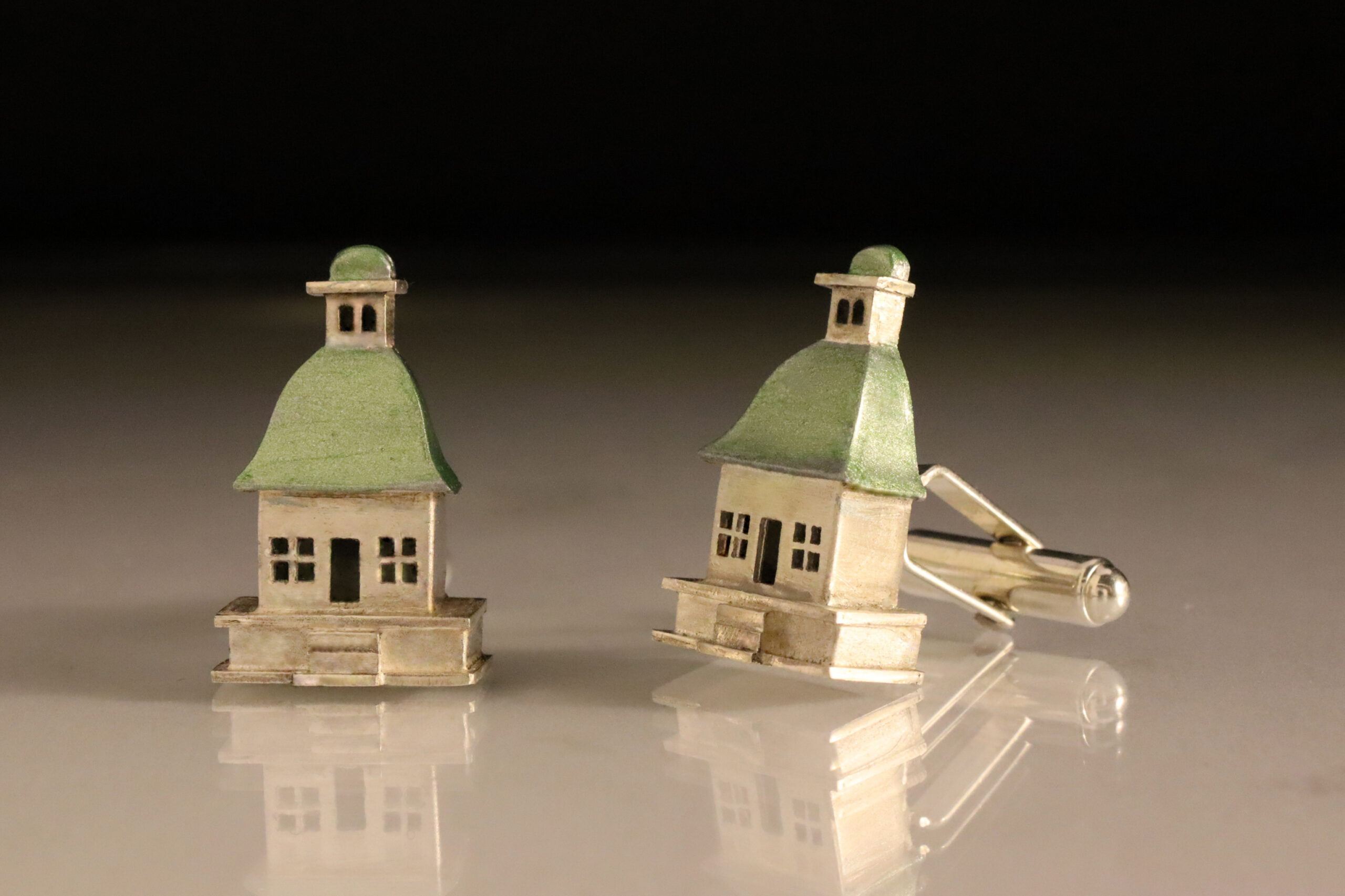 Duck House cufflinks, 2009, silver with gold enamel, 14x24x8mm deep