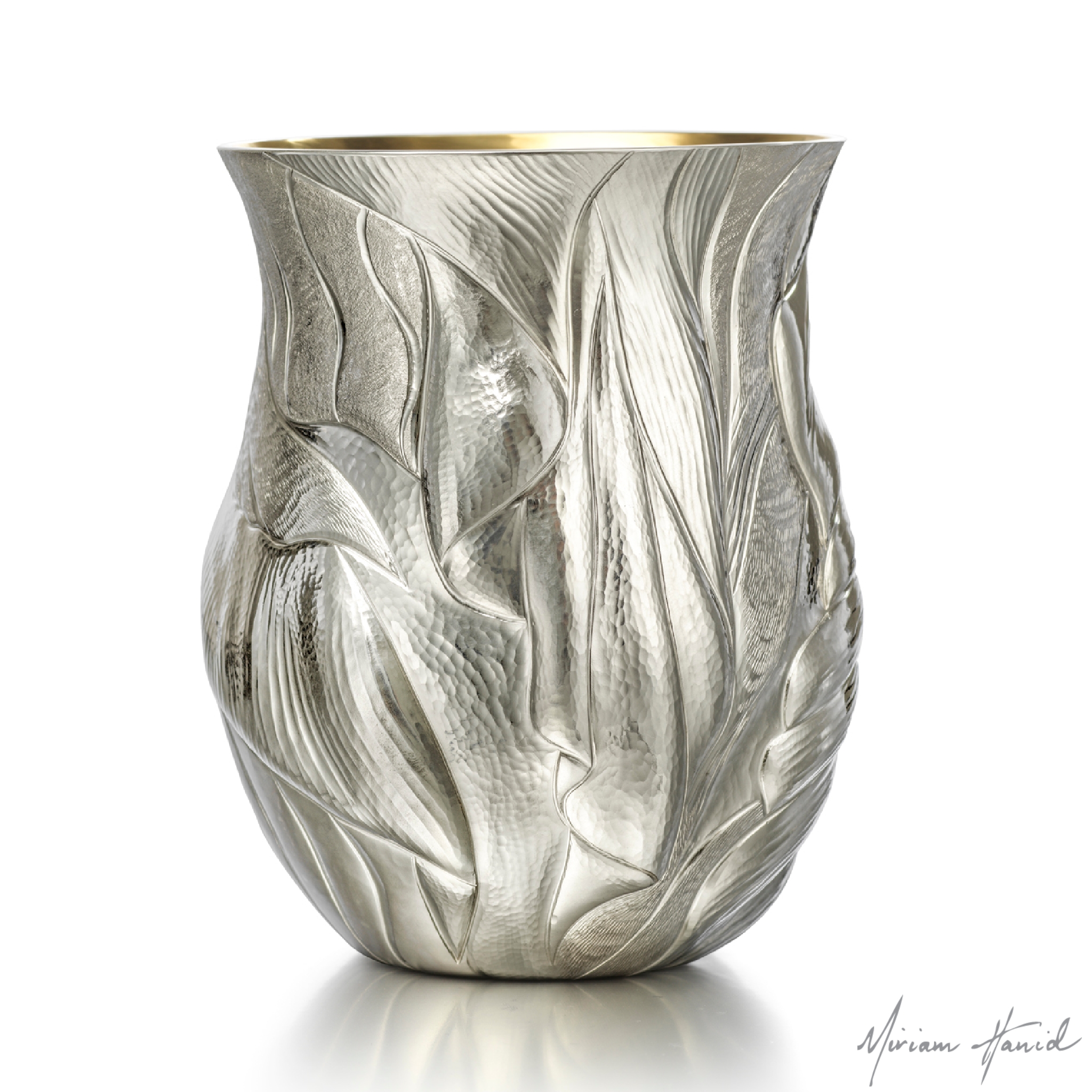 Miriam Hanid, Cascade Tumbler, 2019, Britannia silver with lemon gilding, hand raised and chased, 10.5 x 8 x 8 cm, photo courtesy of the artist
