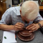 Duncan Baird-Murray, focussing on a piece, © Armadillo Central, 2017