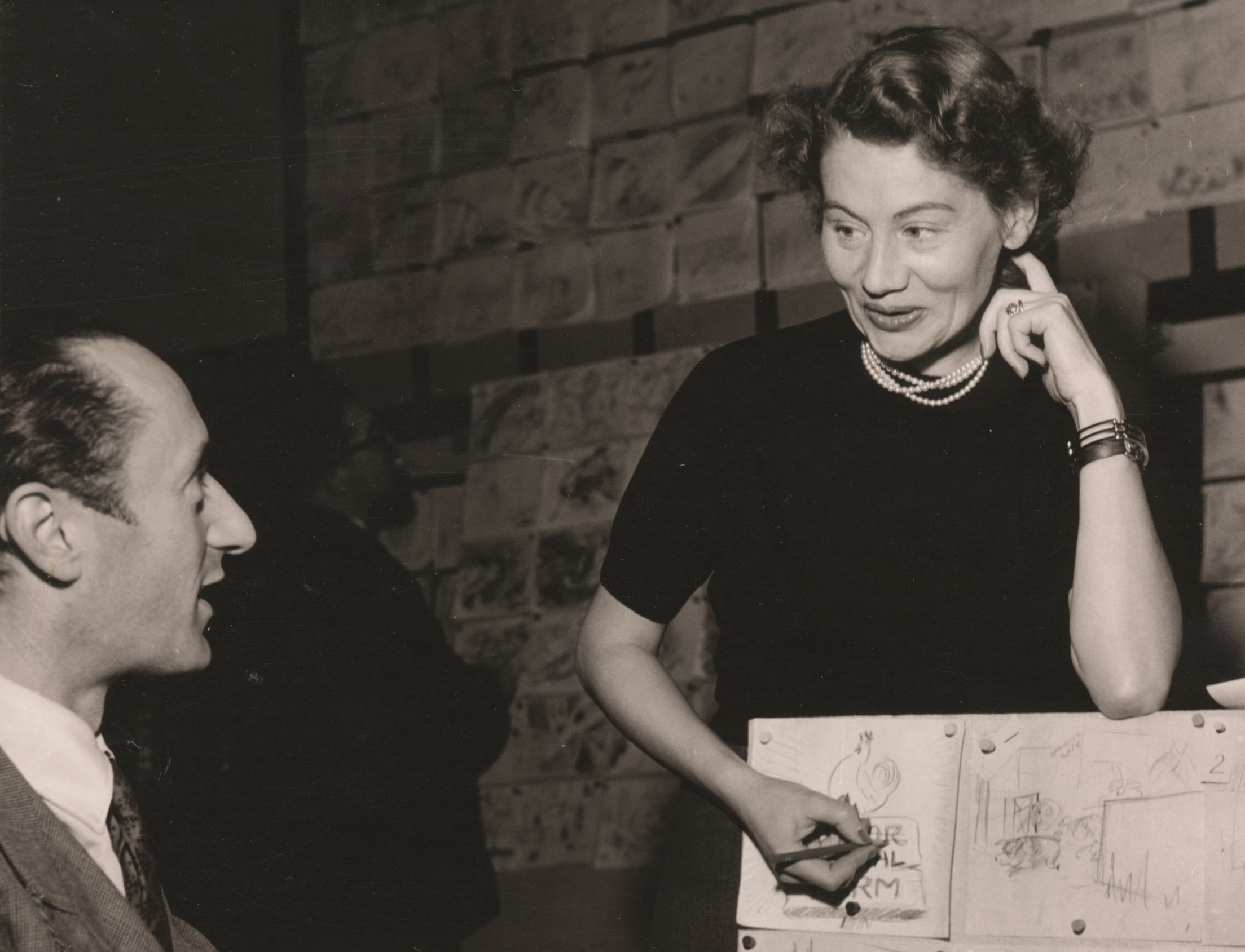 John Halas and Joy Batchelor with Animal Farm layouts 