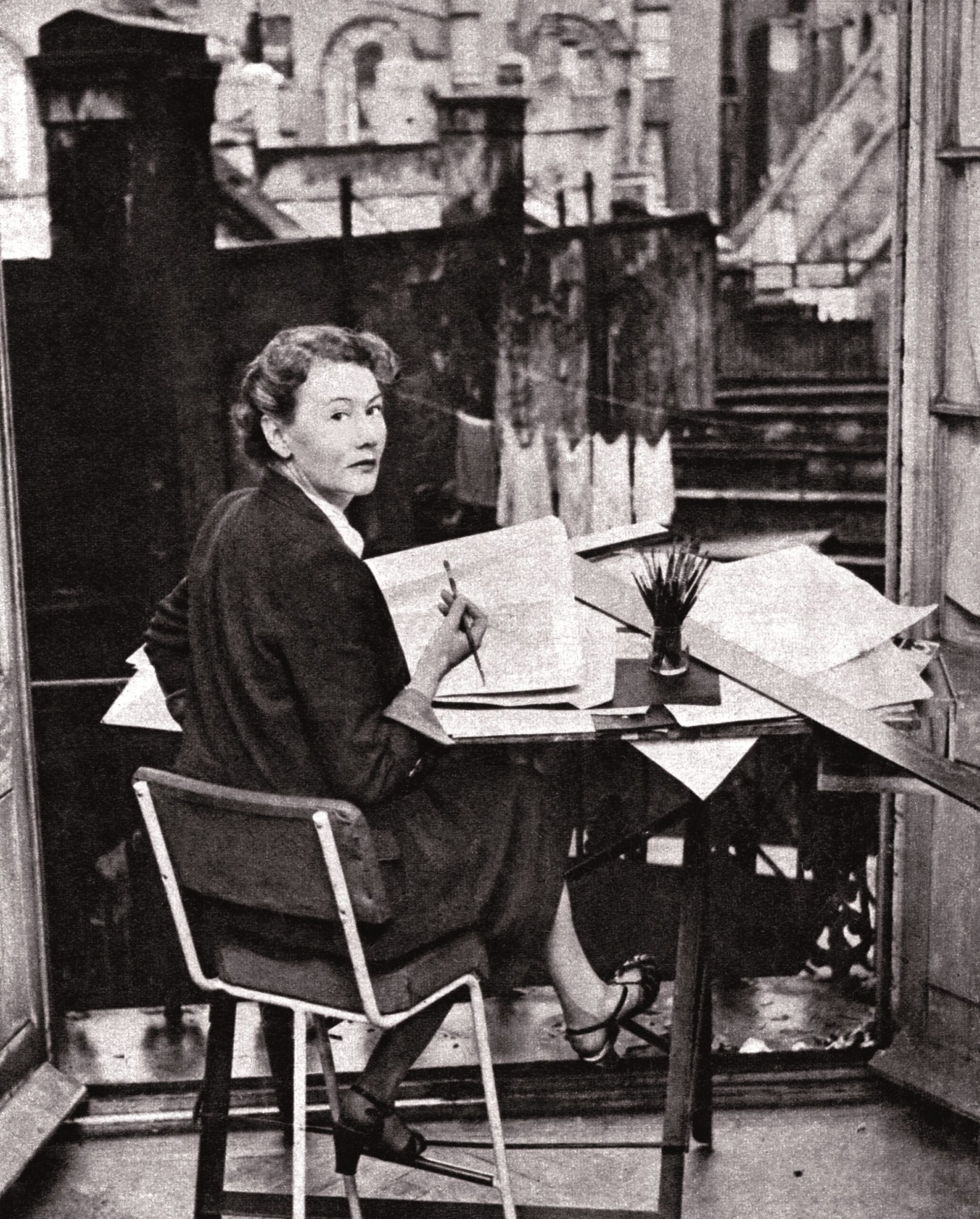 Joy Batchelor at her desk, copyright Halas and Batchelor