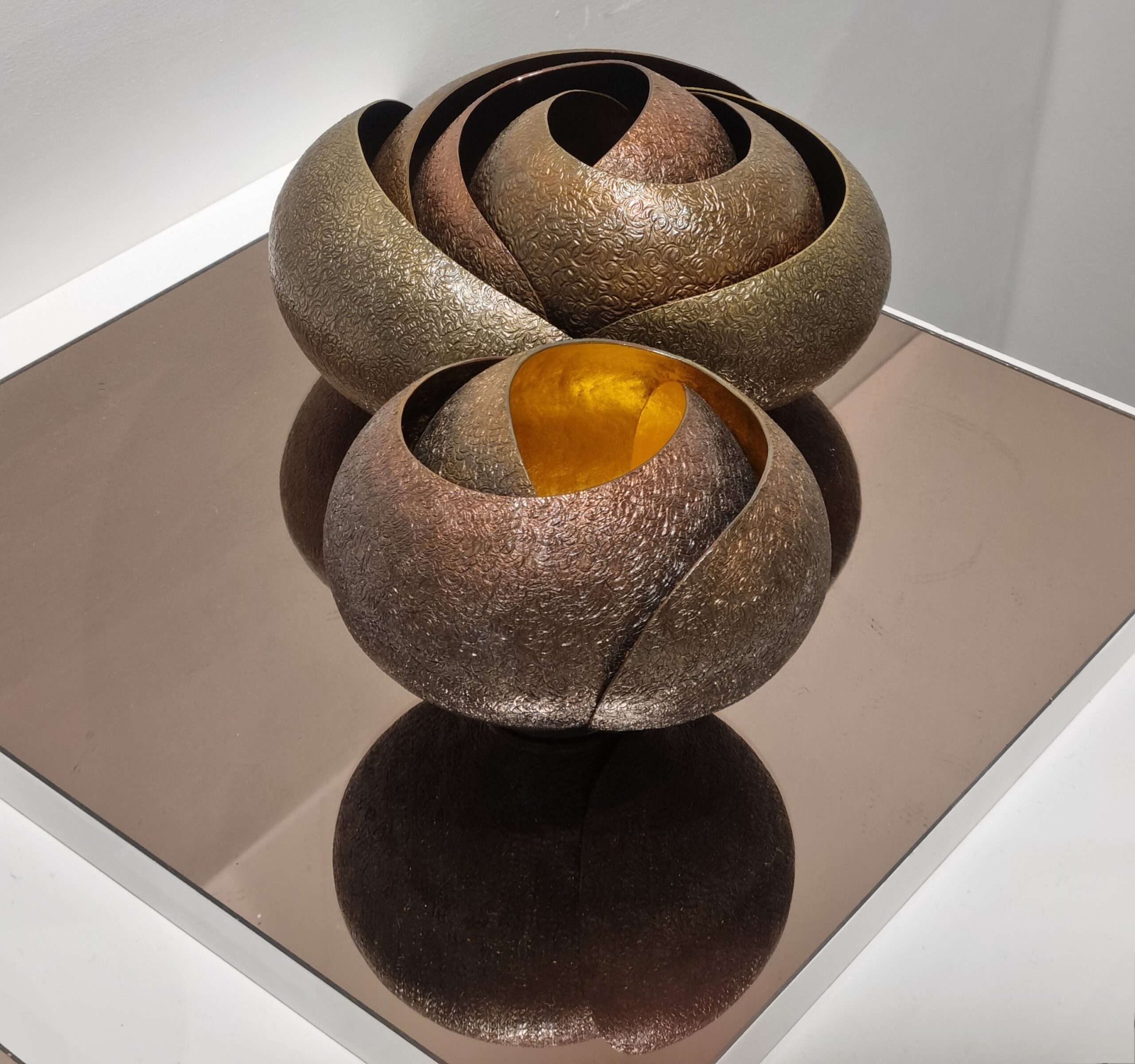 Rose sculpture works by Jessica Jue in copper, brass and gilding metal