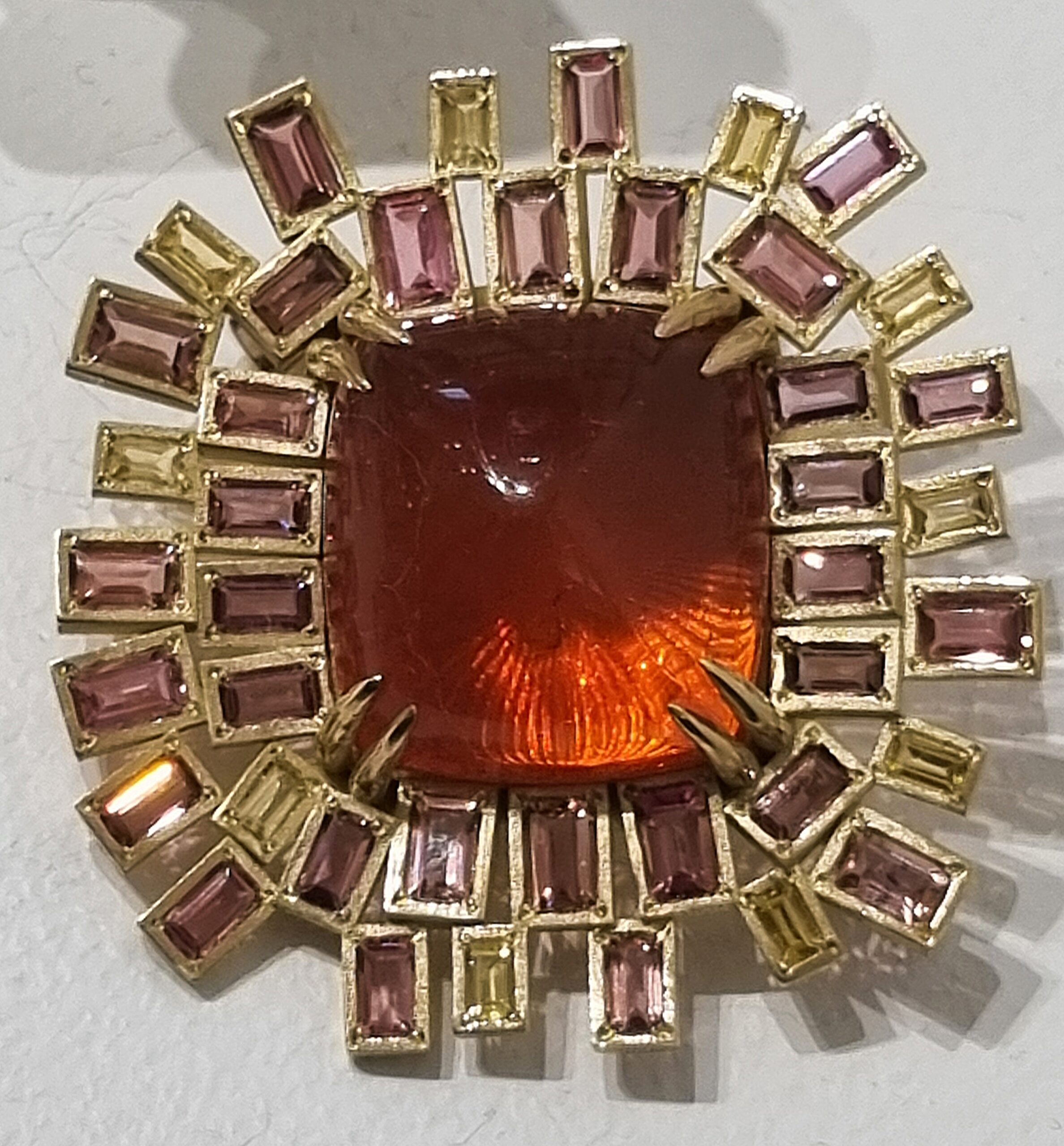 Fire opal ring with tourmalines and yellow beryls set in gold, by 