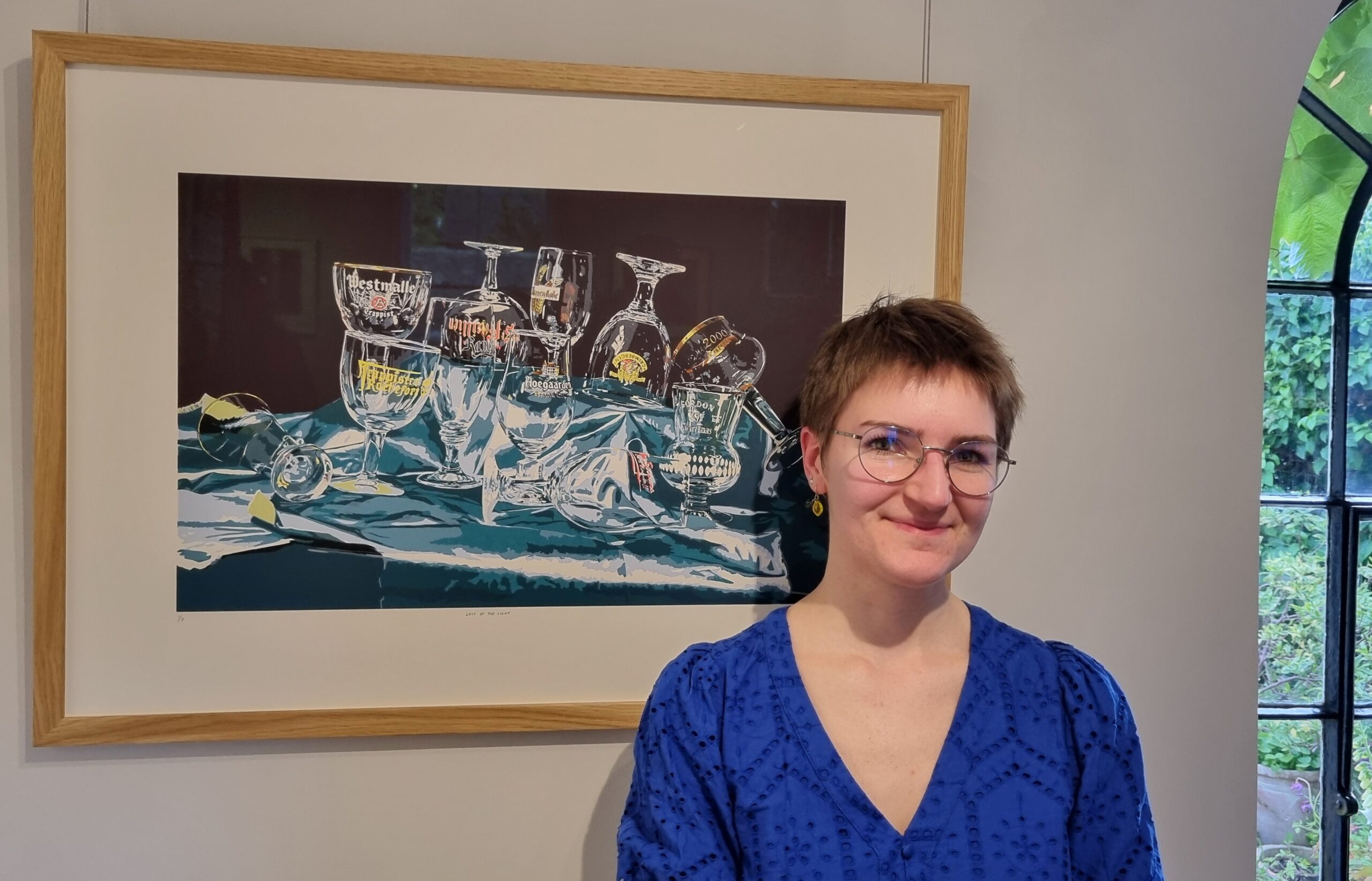 Sarah Vines next to her 'Last of the Light' screenprint © Emma Boden 2026