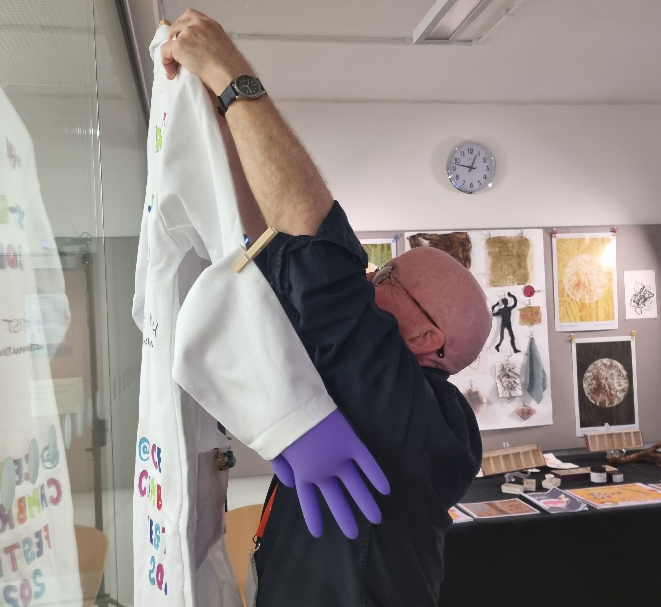 Setting up the display for Diana Scarborough's 'The Art of Eco-conscious Colour' 2026 © Armadillo Central 
